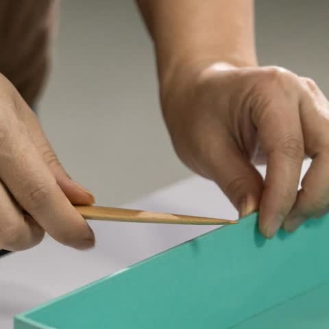 Hand-finishing detail, hot foil stamping process