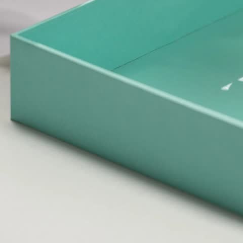 Hand-finishing detail, soft-touch lamination process