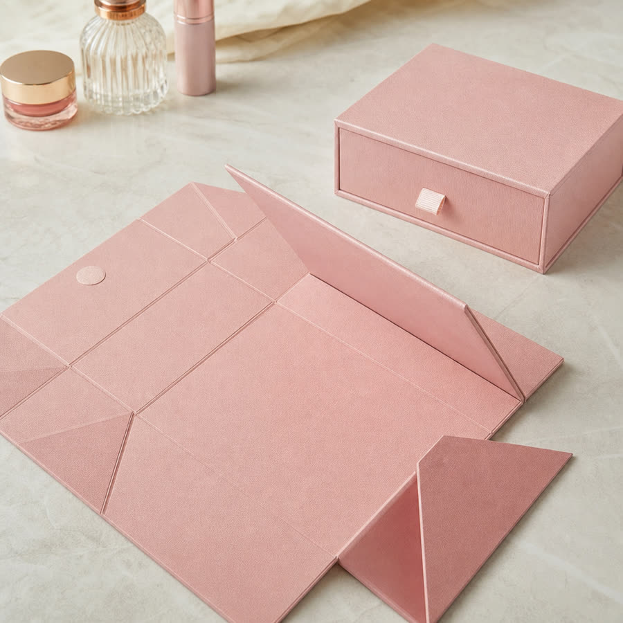 Collapsible cosmetics box shown partially folded flat