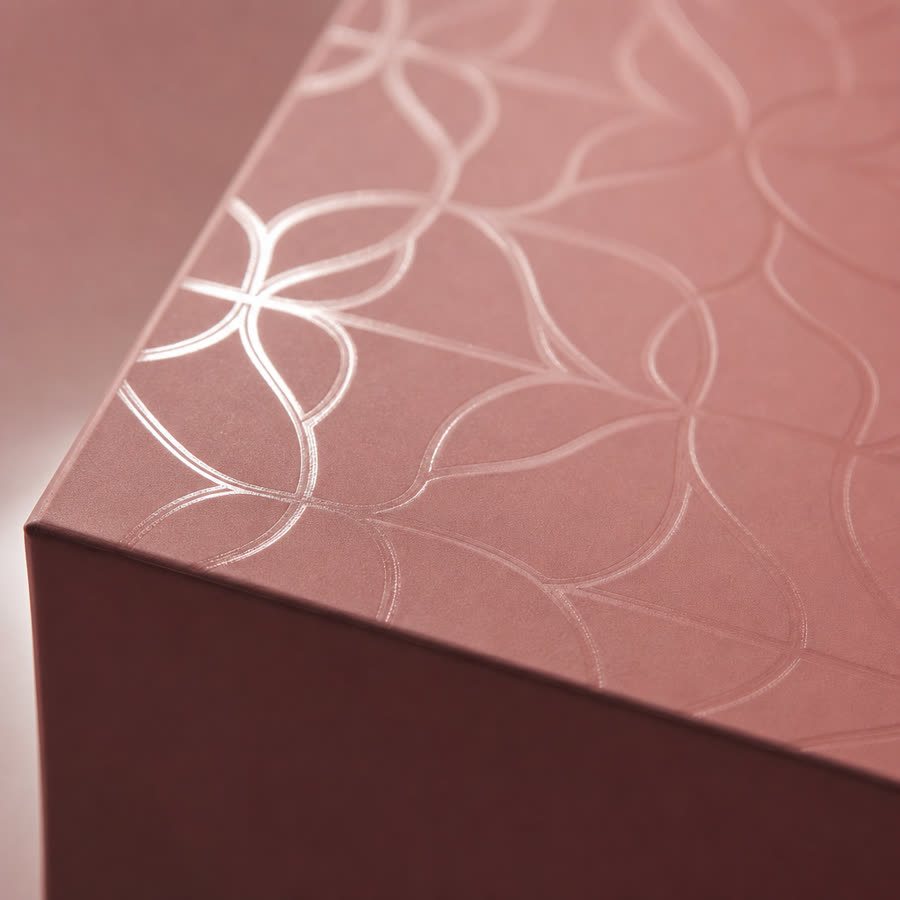 Macro detail of spot UV gloss on matte board